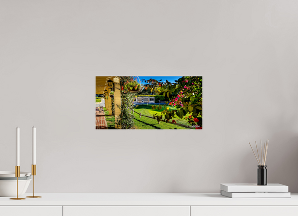 Beautiful view from Pebble Beach Golf Links featuring the Champions of Pebble Beach monument and vibrant flowers.