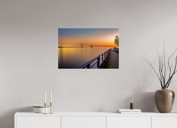 Serene sunset view of Grand Haven channel, capturing the essence of Calm on the Channel. Perfect for coastal decor.