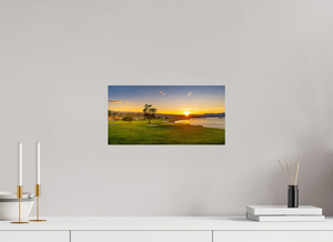 Capture the serene sunrise over the iconic No. 18 at Pebble Beach, enhancing your space with vibrant beauty.
