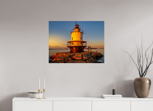 Golden Hour at Spring Point Ledge Lighthouse captures Maine's coastal charm with stunning sunset hues.