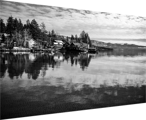 Serenity on the Water – Lake Tahoe in Black and White showcases tranquil lakeside reflections and stunning pines.