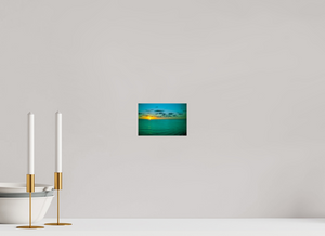 A Caribbean Sunset painting captures the vibrant hues of a stunning Caribbean sunset over calm waters.