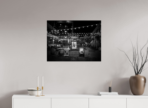 Enchanting San Francisco Nights – Ghirardelli Square captured in black and white with glowing lights and vibrant ambiance.