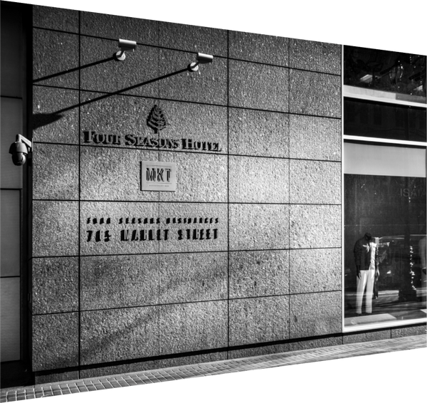 Elegant facade of Four Seasons Hotel, showcasing Urban Reflections – Four Seasons, Market Street in San Francisco.