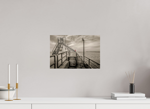 Big Red on the Grand Haven Pier showcases a striking lighthouse against a moody black-and-white backdrop.