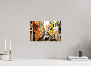Canal view in Venice, Italy, showcasing colorful buildings and boats, perfect for your "Delivery Enroute" decor.