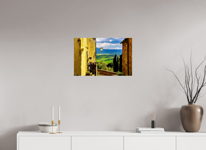 A View from Pienza showcases Tuscany's rolling hills framed by charming architecture. Perfect for home decor.