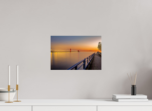 Beautiful sunset over Grand Haven channel, capturing the essence of "Calm on the Channel." Perfect for serene decor.