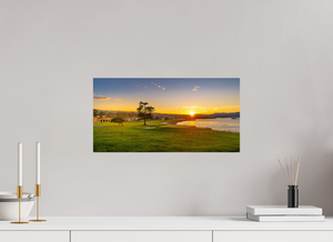 Breathtaking sunrise at No. 18 at Pebble Beach, showcasing vibrant greens and blues for a stunning décor piece.