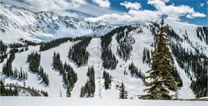 Breathtaking view of the Face of A-Basin, showcasing Arapahoe Basin's stunning snowy slopes and peaks.