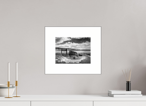 Black-and-white photo showcasing the Grand Haven Harbor Navigation Project along Michigan's rugged lakeshore.