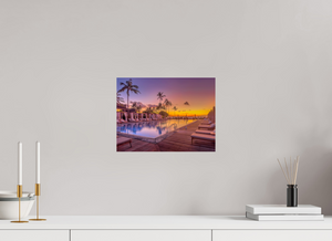 Relax by the serene water at The Pool at the Four Seasons - Hualalai, featuring stunning sunset views.