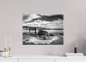 Striking black-and-white view of the Grand Haven Harbor Navigation Project, showcasing Michigan's rugged lakeshore beauty.