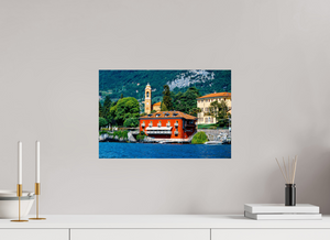 Elegant dining on Lake Como, featuring a picturesque restaurant by the water's edge and scenic views.