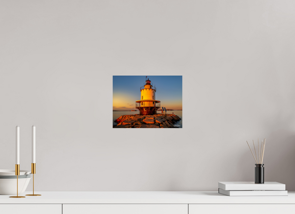 Golden Hour at Spring Point Ledge Lighthouse showcases Portland Harbor’s historic charm and stunning sunset hues.