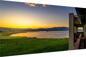 Breathtaking sunrise at Pebble Beach Golf Links, showcasing the 18th green and Pacific Ocean view. Fine art print.