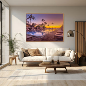 Relax by the tranquil waters at The Pool at the Four Seasons - Hualalai, enjoying stunning sunset views.