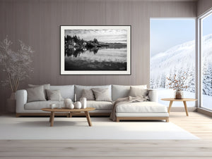 Stylish living room featuring "Serenity on the Water – Lake Tahoe in Black and White" artwork, capturing tranquil lakeside reflections.